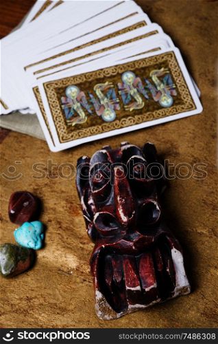 divination card Tarot with devil figure. close up