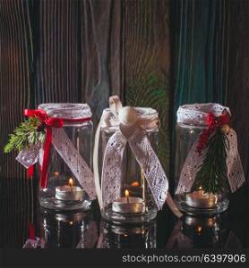 DIY glass candlesticks Christmas decor with lace and ribbons. Christmas glass candlesticks