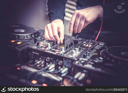 DJ at the remote control. Mixer remote at the concert. Musical equipment.. DJ at the remote control. Mixer remote at concert. Musical equipment.