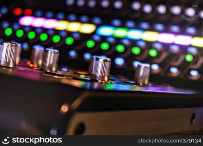 DJ CD player audio mixer and amplifier in nightclub