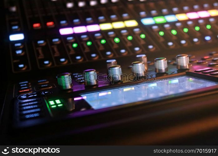 DJ CD player audio mixer and amplifier in nightclub