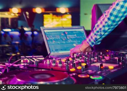 DJ mixer at a nightclub. close-up