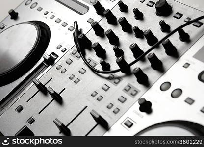 Dj mixer equipment to control sound and play music