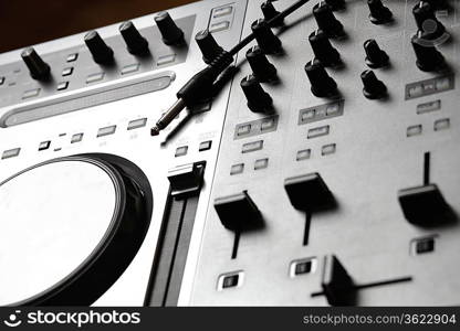 Dj mixer equipment to control sound and play music