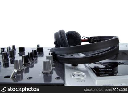 dj mixer with headphones isolated on white