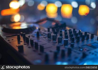 DJ mixing console. Tune in before a concert