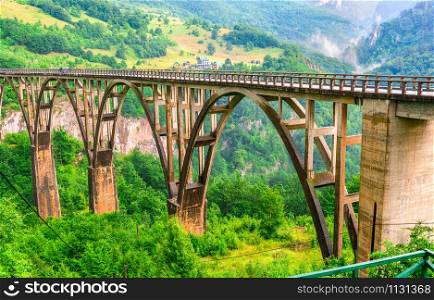 Djurdjevica Bridge over river Tara in the mountains of Montenegro. Djurdjevica Bridge in Montenegro
