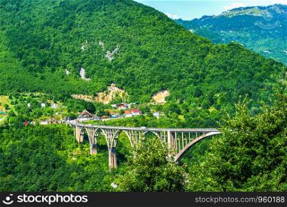 Djurdjevicha bridge over river Tara in mountains of Montenegro. Bridge over river Tara