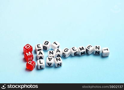 DMP Debt Management Plan written on cubes on blue background