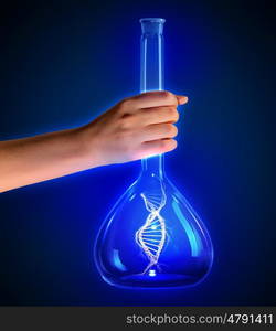 DNA in test tube. Close up of human hand holding tube with DNA molecule