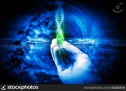 DNA molecule. Close up image of human hand holding test tube. Science concept