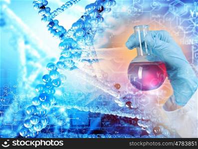 DNA molecule. Close up image of human hand holding test tube. Science concept