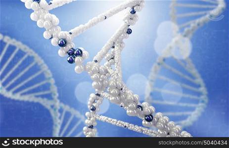 DNA molecule. Concept of biochemistry with dna molecule on blue background