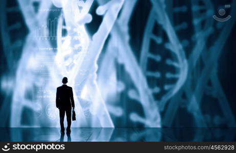 Dna research. Businessman standing with back and virtual panel with dna spiral