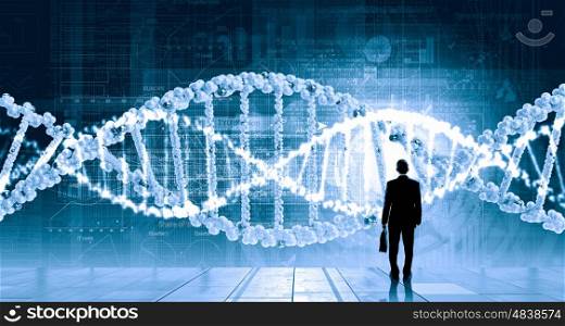Dna research. Businessman standing with back and virtual panel with dna spiral