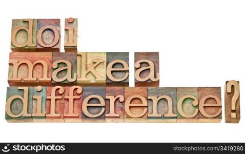 Do I make a difference? A question in vintage wooden letterpress printing blocks isolated on white.