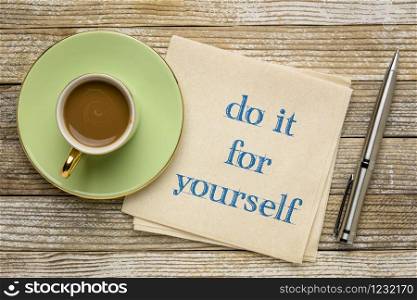 do it for yourself inspirational note - handwriting on a napkin with a cup of coffee, self care concept