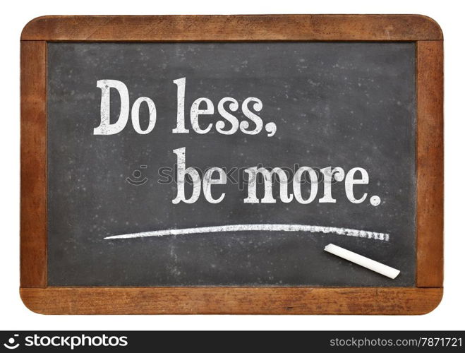 Do lees, be more - motivational advice on a vintage slate blackboard