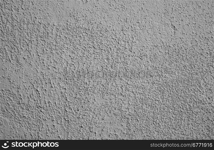 Do not plastered and not smooth wall in grey colour.Clearly visible brickwork and all the bumps and rough wall.Ideally for texture and backgrounds.Horizontal view.