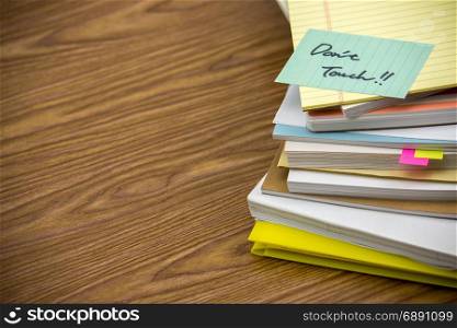 Do not Touch; The Pile of Business Documents on the Desk
