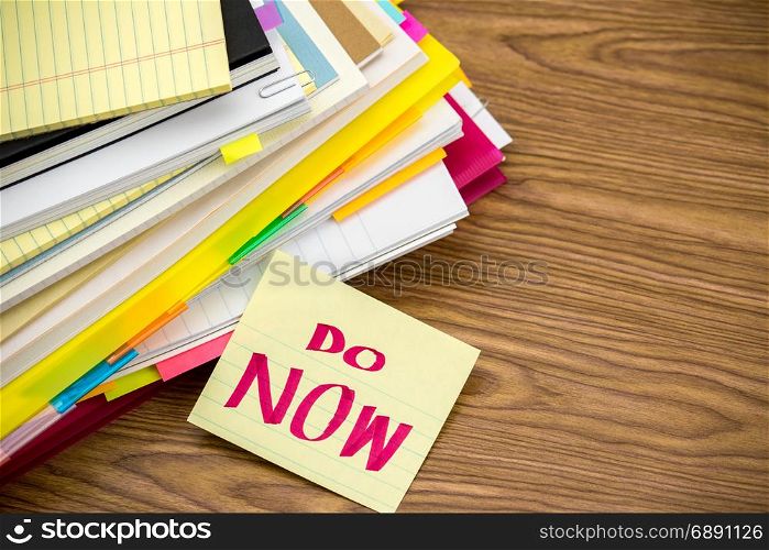 Do Now; The Pile of Business Documents on the Desk