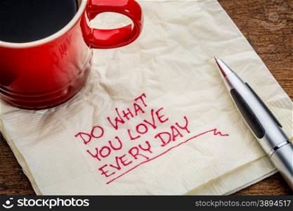 Do what you love every day - inspirational handwriting on a napkin with a cup of coffee