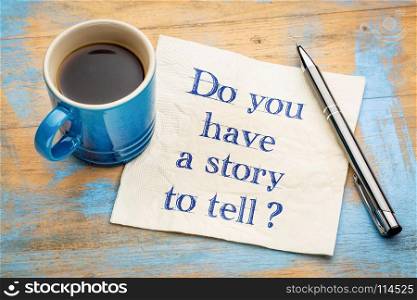 Do you have a story to tell? Handwriting on a napkin with a cup of espresso coffee
