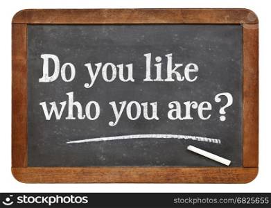 Do you like who you are? A question in white chalk on a vintage slate blackboard
