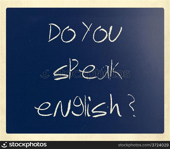 ""Do you speak english" handwritten with white chalk on a blackboard."