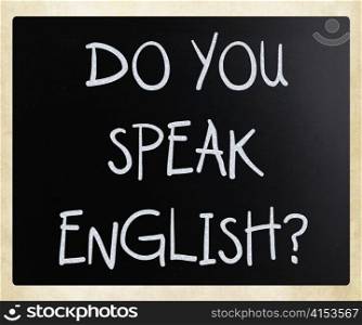 ""Do you speak english" handwritten with white chalk on a blackboard"