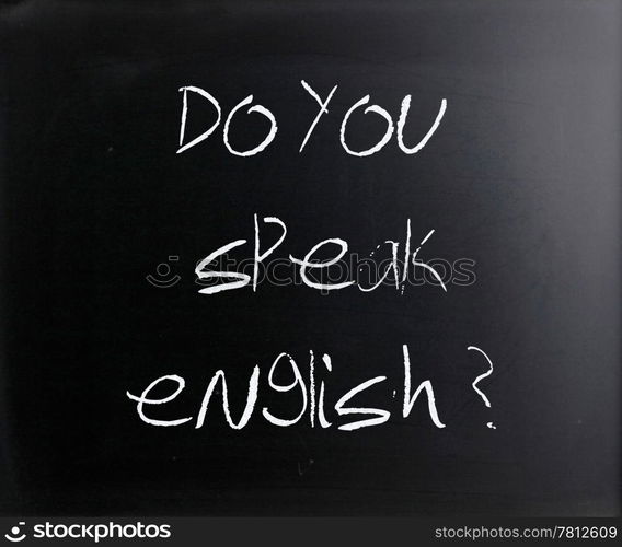 ""Do you speak english" handwritten with white chalk on a blackboard."