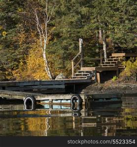 Dock at the lakeside, Kenora, Lake of The Woods, Ontario, Canada