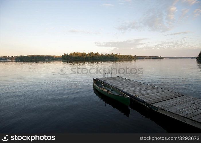 Dock in the water with horizon sky at Lake of the Woods, Ontario