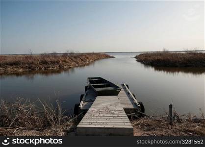 Dock on Lake Winnipeg shoreline in Gimli, Manitoba Canada