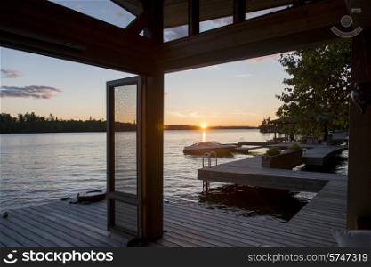 Dock over the lake at sunrise, Lake of The Woods, Ontario, Canada