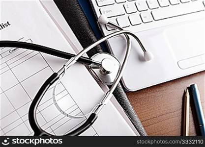 doctor&acute;s everyday items ,focus point on metal part of stethoscope