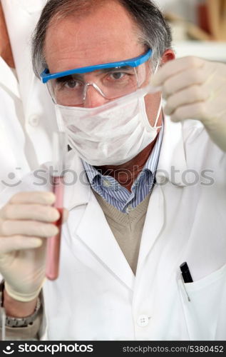 doctor analysing test-tube