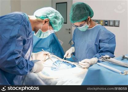 Doctor and assistant nurse operating for rescue patient from dangerous emergency case. Hospital and Surgery Concept. Health care and Medical concept. Cancer and disease treatment.
