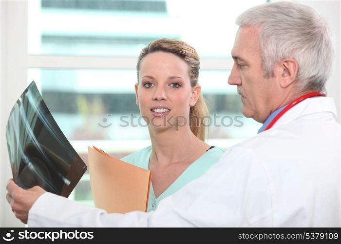 Doctor and colleague with x-ray