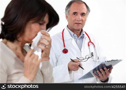 doctor and female patient with flu
