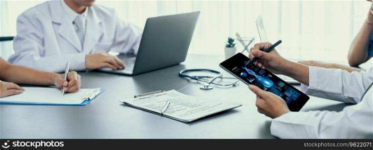 Doctor and nurse in medical meeting discussing strategic medical treatment plan together with report and laptop. Medical school workshop training concept in panoramic banner. Neoteric. Doctor and nurse in medical meeting discussing plan together. Neoteric
