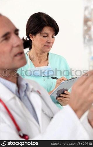doctor and nurse on a professional meeting