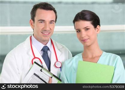 doctor and nurse posing