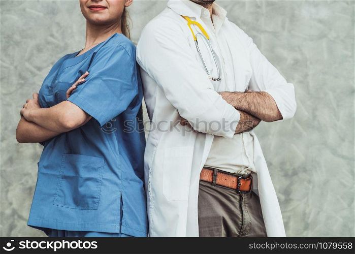 Doctor and nurse working in hospital. Healthcare and medical staff service concept.
