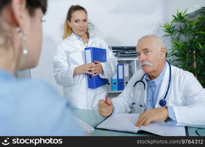 doctor and patient are discussing something