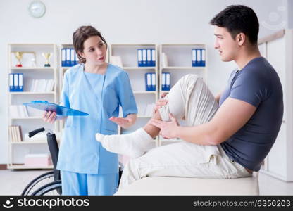 Doctor and patient during check-up for injury in hospital