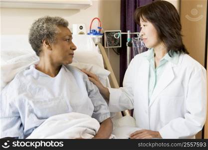 Doctor And Patient Looking At Each Other