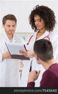 doctor and patient talking in office
