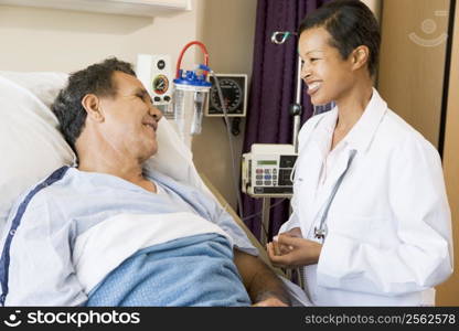 Doctor And Patient Talking To Each Other,Smiling