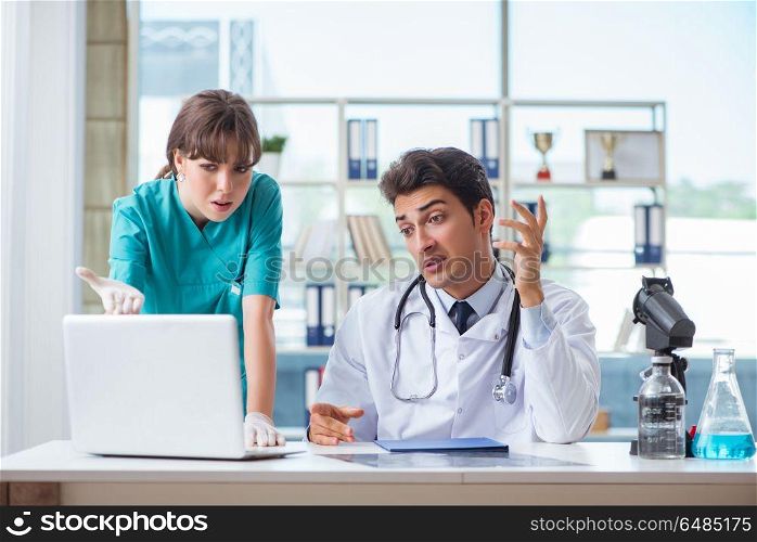 Doctor angry at his assistant due to medical error